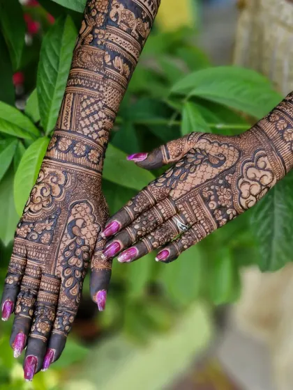 A beautiful example of intricate bridal mehendi with peacock and floral motifs, perfect for a bride who loves detailed and delicate patterns.