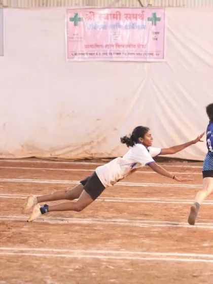 A full-stretch dive by one of our female athletes, showing incredible commitment.