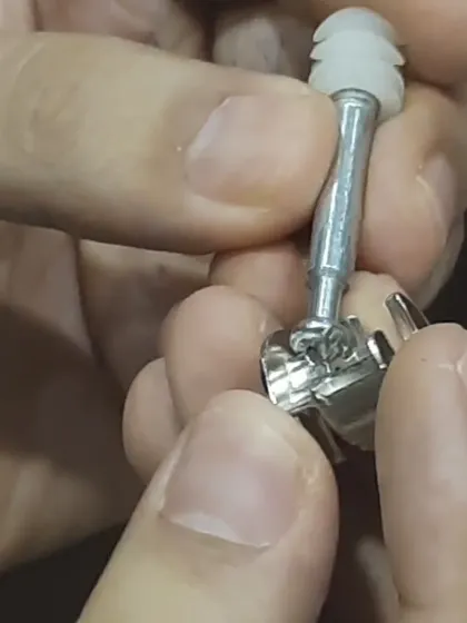 A close-up of a mini-fix connector being assembled. Students learn how these fittings work to pull joints together tightly, allowing for furniture that can be easily assembled and disassembled.