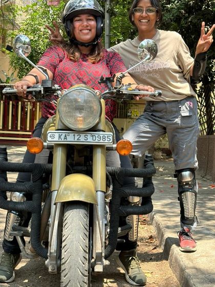 Two graduates celebrating their success. The sisterhood and support within our community are just as important as the riding skills.