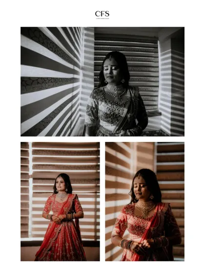A creative bridal portrait using the shadows from window blinds to create a dramatic effect. This artistic approach showcases the bride's red lehenga in a unique and memorable way.