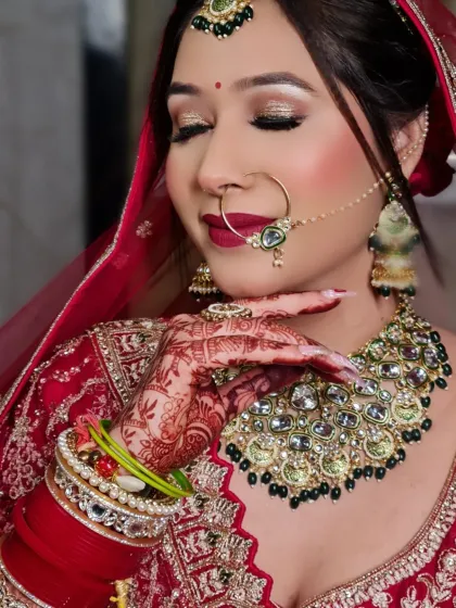 The perfect bridal pose. My bride looks absolutely beautiful with her hands framing her face, showing off her intricate henna and stunning makeup.