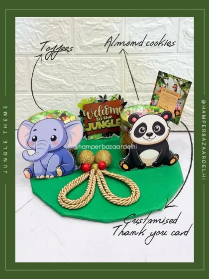 A breakdown of what's inside our ₹350 jungle hamper: assorted toffees, almond cookies, and a custom thank you card.