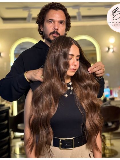 Confidence comes from hair that feels as good as it looks. This rich brown color is styled to perfection, highlighting its depth and dimension.