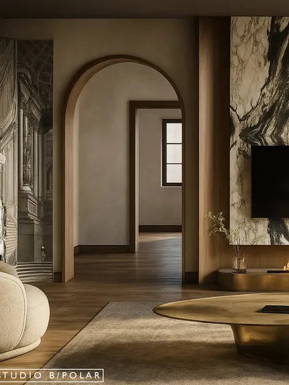 We love creating a journey through a home. This view shows how the arched doorway frames the next space, while a curved wall with mural wallpaper on the left adds an artistic layer, softening the room's edges.