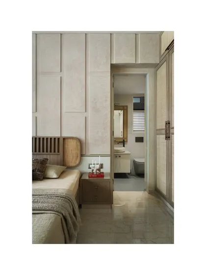 A full view of the parents' bedroom, showing the seamless integration of the bedroom and ensuite bathroom.