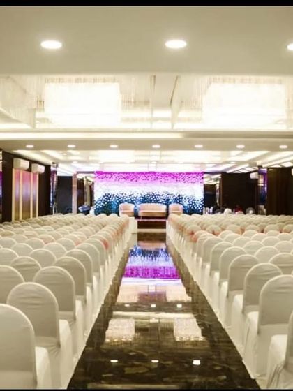 A look down the aisle of Ellora Banquet hall in Sanpada. The reflective flooring and crystal chandeliers add a touch of glamour to the venue.