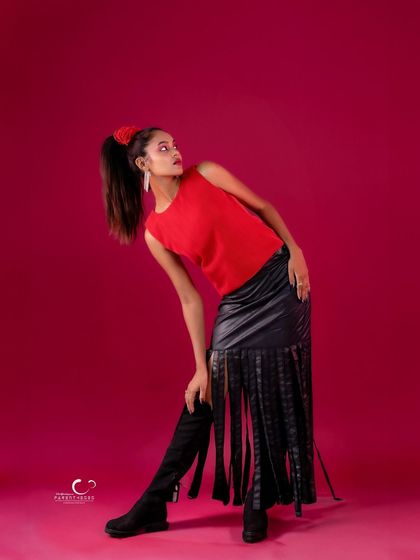 A dynamic and expressive pose that feels like a dance. The movement in the shot is captivating.