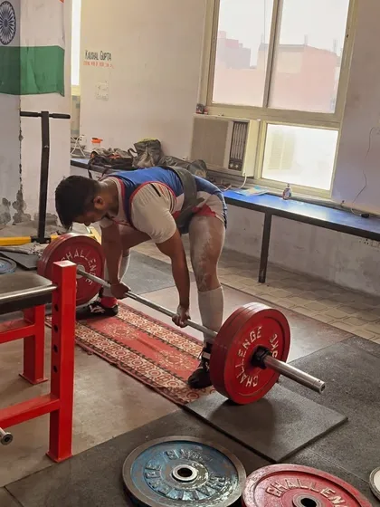 My student Javed doing a deadlift set of 220 kg for 5 reps. We focus on consistent training for long-term gains.