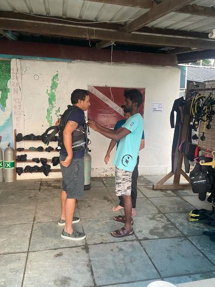 Moments from our Andaman dive trips, showing everything from gearing up at the dive center to relaxing on the boat between dives.
