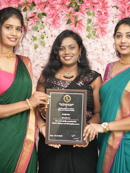 A proud moment for a student from Batch 14 as she receives her professional makeup and hairstyling certificate.