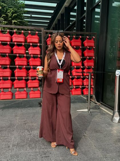 Coffee in hand, ready to take on a full day of hosting the D2C Summit and Awards.