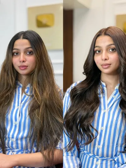 A perfect example of a before and after. We corrected her previous uneven color to create this rich, glossy chocolate brown look. The shine and health of the hair speak for themselves.