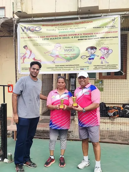 The winners of the Mixed Doubles category receiving their trophies. This event was a popular part of the WCG festival.