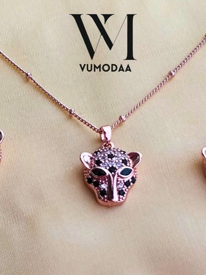 A chic and trendy rose gold necklace set with a panther motif from Vumodaa, a fashion jewellery brand.