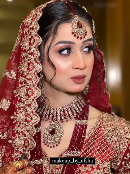Another angle of this beautiful bride, showcasing the flawless makeup from all sides.