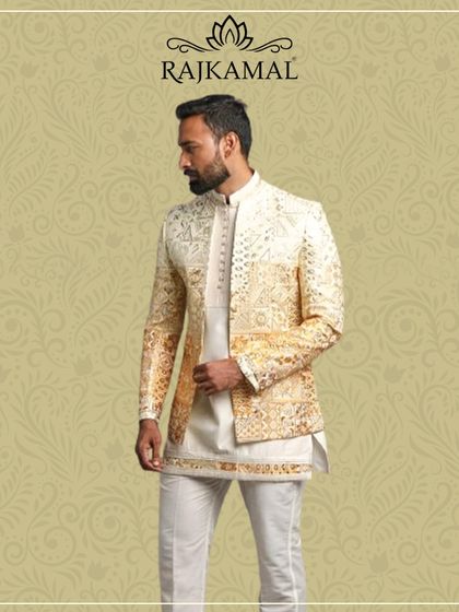 For a warmer, more festive look, this golden Indo-Western jacket with sequin work is an excellent choice. It pairs beautifully with a cream kurta for a balanced and stylish ensemble.