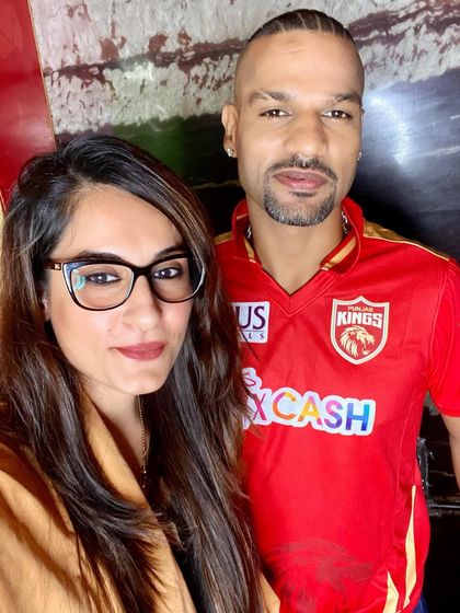 Here I am with cricketer Shikhar Dhawan after doing his makeup for a Punjab Kings IPL shoot. Working with athletes for commercial shoots requires a specific skill set to ensure the makeup looks natural and holds up under studio lights.