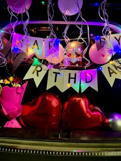 A birthday surprise on the go. I can decorate a car boot with balloons, a "Happy Birthday" banner, fairy lights, and even a bouquet and cake, making for a unique and memorable reveal for your loved one.