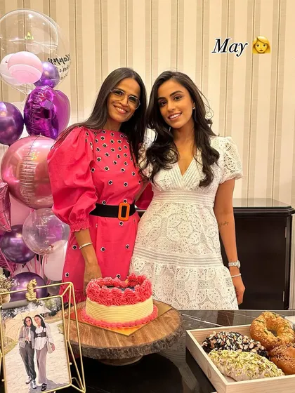 A beautiful moment celebrating Mother's Day with a custom pink and yellow buttercream cake.