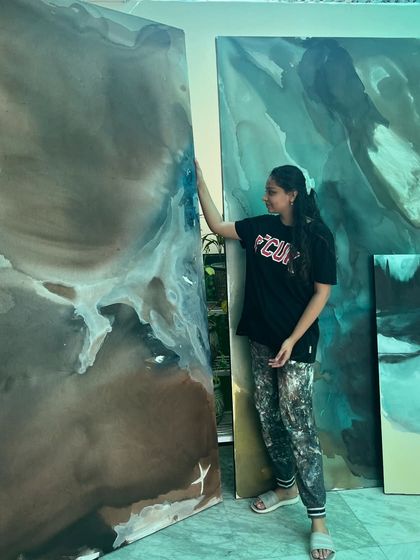 Me working on one of the giant 8ft x 4ft canvases. You can get a sense of the scale and the amount of space these pieces command.