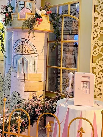 A close-up of the hand-drawn building facades, showing the artistic detail that goes into each custom prop.