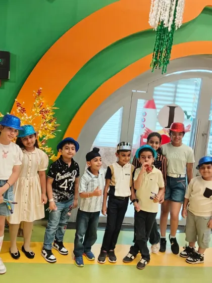 A cool crew of kids poses together, showing off the friendships and fun that happen at Tingaland.