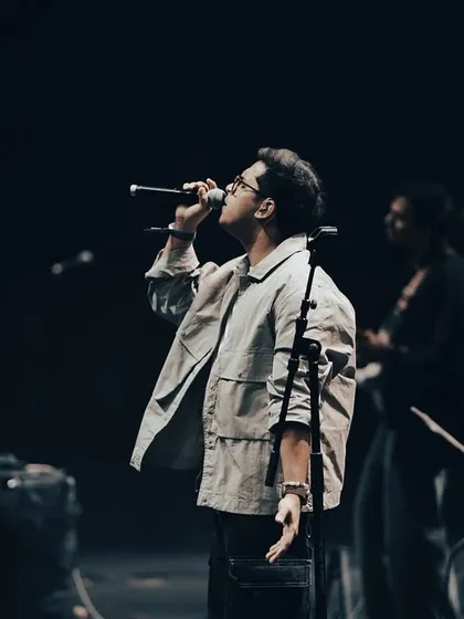 Lost in the music during our Pune performance. When I'm on stage, I give it my all. This is me in my element, delivering a vocal performance with the band backing me up.