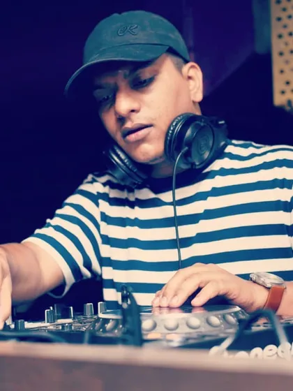A close-up of me working the controls. I use professional Pioneer DJ equipment, the industry standard for clubs worldwide.