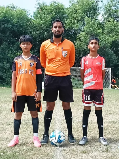 The captains' handshake before our U13 match against Induz Sportz FA in the Delhi Youth League.