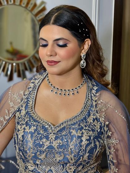 Another close-up of the bold blue eye makeup. This is a fantastic choice for anyone wanting to make a statement at an evening event.