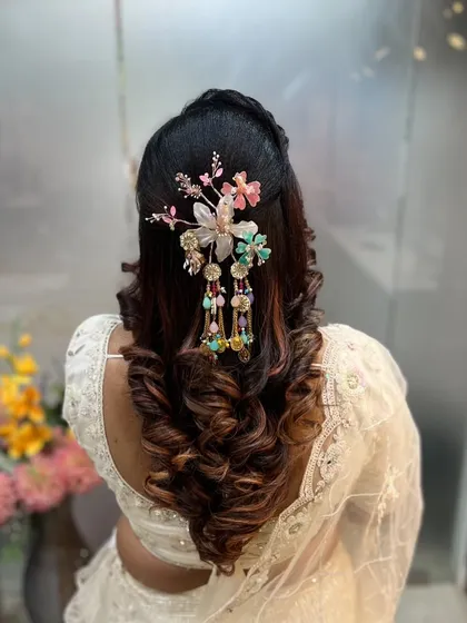 Another view of the statement floral hair accessory, showing its intricate details.