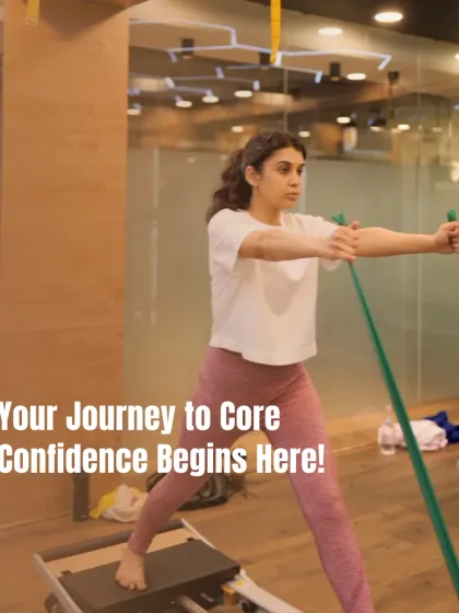 Your journey to core confidence begins here. This client uses a resistance band on the reformer to add a challenge to her leg work, engaging her core to maintain stability.