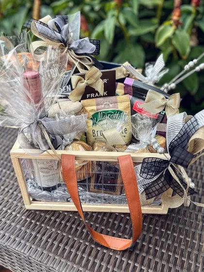 I designed this luxury goodie basket for a "CEO in the making." It’s filled with a curated selection of gourmet snacks and drinks, showcasing how I tailor each hamper to the recipient's lifestyle and the occasion.