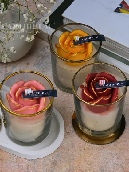My floral votive candles are handcrafted with delicate petal detailing and a touch of gold for a truly elegant finish. This trio of rose candles shows the different blooms I can create, each designed to be a beautiful gift of light and fragrance.