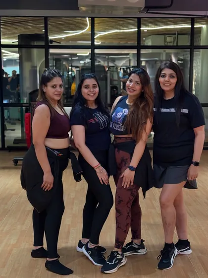 My awesome clients, always ready for a picture after class. Their dedication inspires me every day.