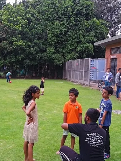 Our coaches are the heart of the party. Here's one of our expert team members explaining the next game, making sure every child feels included, understood, and ready for the next fun challenge.