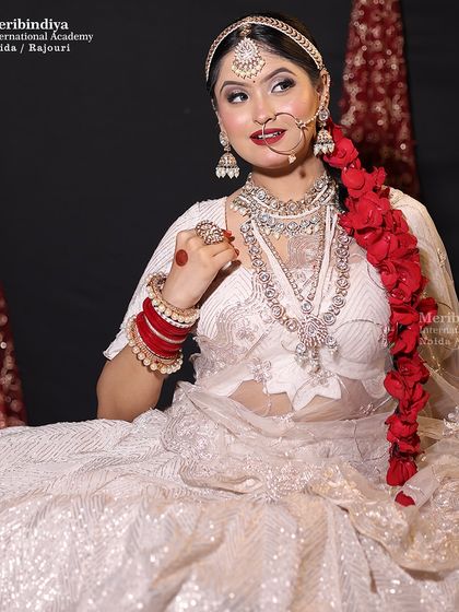 A joyful bride captured in a moment of happiness. The makeup enhances her natural beauty without looking heavy, a key technique for modern brides.