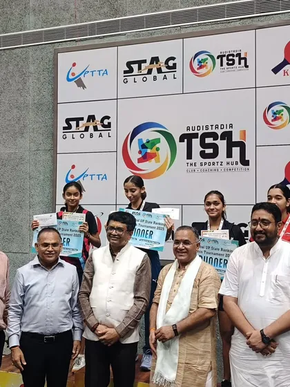 A group photo of our winning girls' team with officials at the UP State Ranking Tournament, a moment of pride for the entire academy.