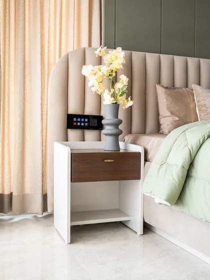 A serene sanctuary designed with muted tones and pastel green hues, this parents’ bedroom exudes understated elegance and warmth. Soft textures and layered lighting elevate the calming palette, creating a restful atmosphere ideal for rejuvenation.