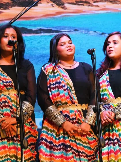 A beautiful shot of our adult students singing in harmony, with a serene backdrop. Each performance tells a story of their musical journey with us.