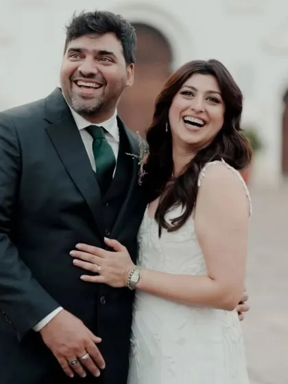 A collection of memories from a beautiful Catholic wedding in Goa. The bride's hair is styled in soft waves under her veil, and her makeup is natural and glowing, capturing her joyful and candid moments perfectly.