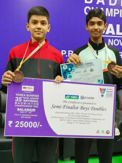 Our U-13 boys' doubles team, Shaurya and Aryan, proudly display their bronze medals and prize from the Sub Junior National Badminton Championships. Their success at the national level is an inspiration to all our players.