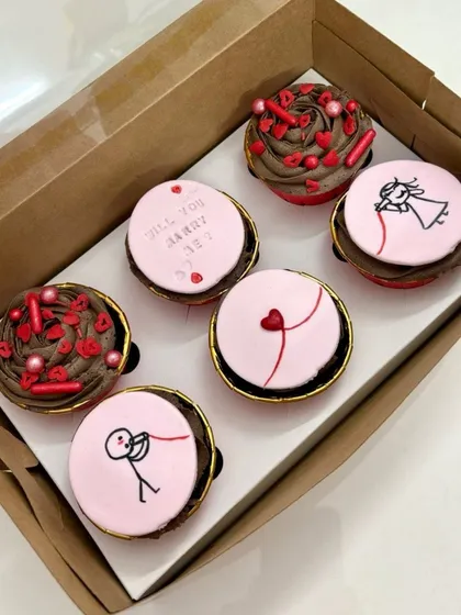 A box of six proposal cupcakes, ready to create a truly memorable moment.