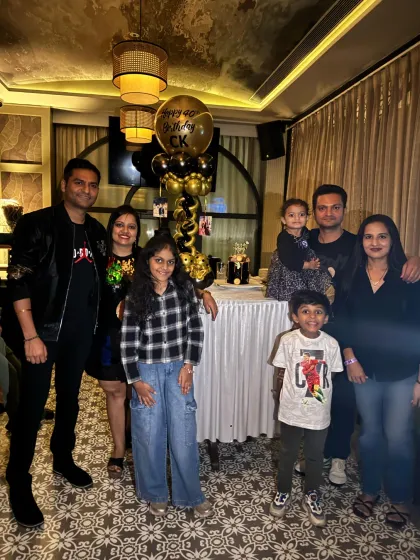 A family photo from the 40th birthday celebration. My goal is to create a beautiful setting that enhances these precious moments.