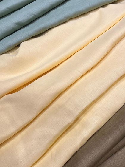 Our linen collection comes in a variety of colors, from earthy neutrals to soft pastels, allowing for true customization.