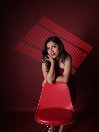 A more reflective and poised look from my red-themed photoshoot. I can switch between high energy and serene elegance depending on the moment.