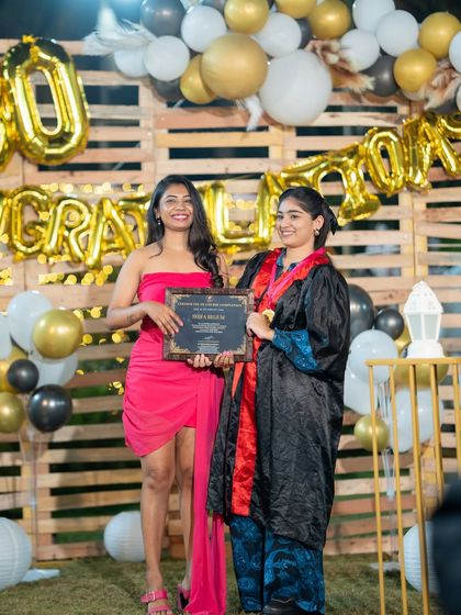 A smile of accomplishment. This student is officially a certified makeup artist.