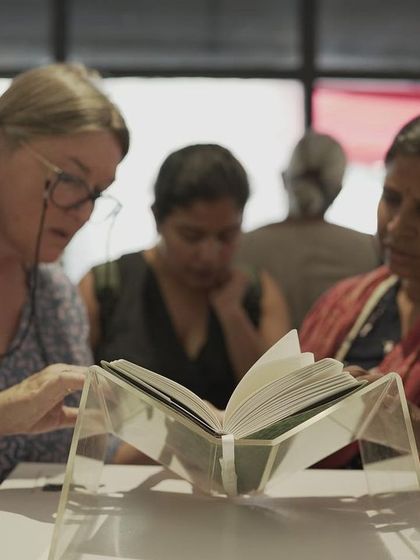 Visitors engaging with the "Mindscapes" exhibition, reading the stories and sharing a moment of reflection. We aim to host art that sparks dialogue and connection.