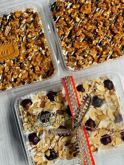 My Tres Leches tubs are perfect for gifting, especially for celebrations like Rakhi. Here you can see a variety of flavors, including Chocolate Mocha Caramel, Choco Biscoff, and Cherry Almond.